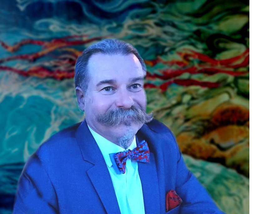 zdjęcie artysty na tle obrazu