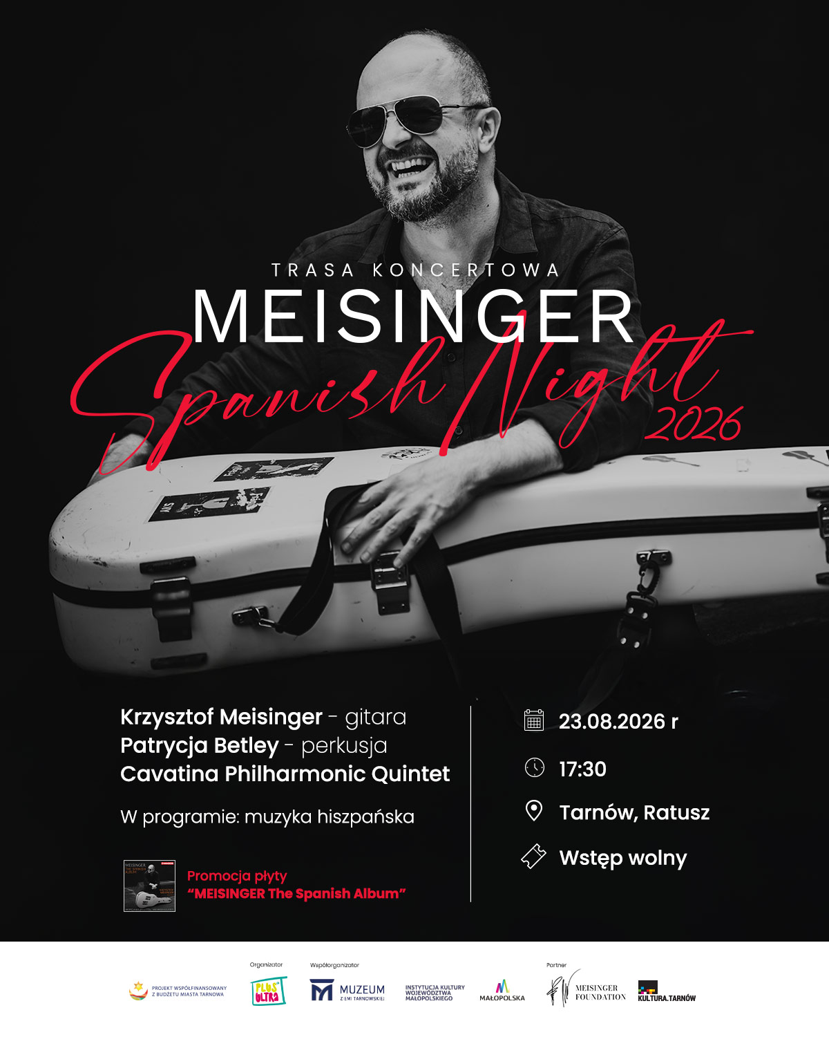 plakat koncertu "Spanish Night" - na zdjęciu gitarzysta trzymający pudło na gitarę